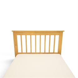 Contemporary light oak trundle bed, slatted headboard and footboard,  incorporating pull-out trundle bed on castors, complete with two memory foam mattresses
