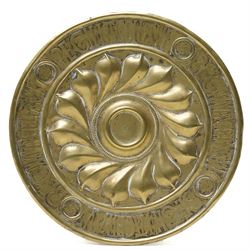 Central section of a 17th century Nuremberg brass alms dish, central rosette surrounded by...