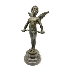 After Moreau, bronzed figure modeled as an angel holding a bow, with foundry mark upon socle base, H30cm