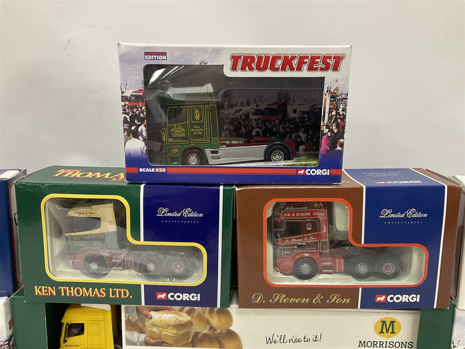 Corgi - nine limited edition die-cast heavy haulage tractor units including five Truckfest CC13223, CC13714, CC12817, CC12815 & CC13728; together with CC12214, CC12107, CC12904 & CC13210; and Morrisons promotional plastic delivery lorry; all boxed (10)