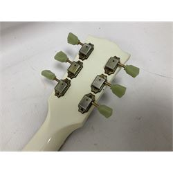 2010 Gibson Les Paul studio guitar, serial no101500537 in white finish with gold and pale green hardware, in Auden soft carry case, guitar L100cm