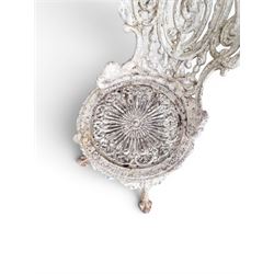 Pair of white painted cast metal garden chairs, ornate reclined backs, circular pierced seats on cabriole legs