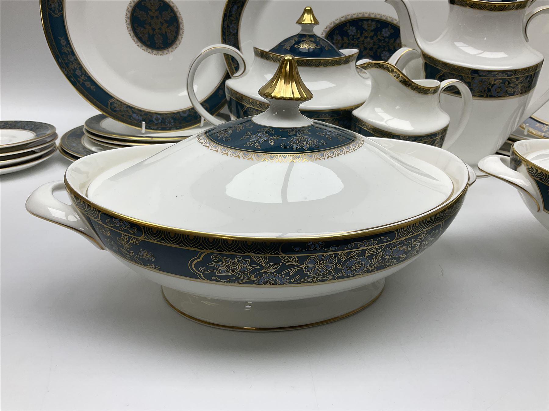 Royal Doulton Carlyle pattern tea and dinner service for six, to include teapot, coffee pot, teacups and saucers, coffee cups and saucers, milk jug, open sucrier, dinner plates, side plates, bowls, soup bowls, to covered dishes etc (64) 