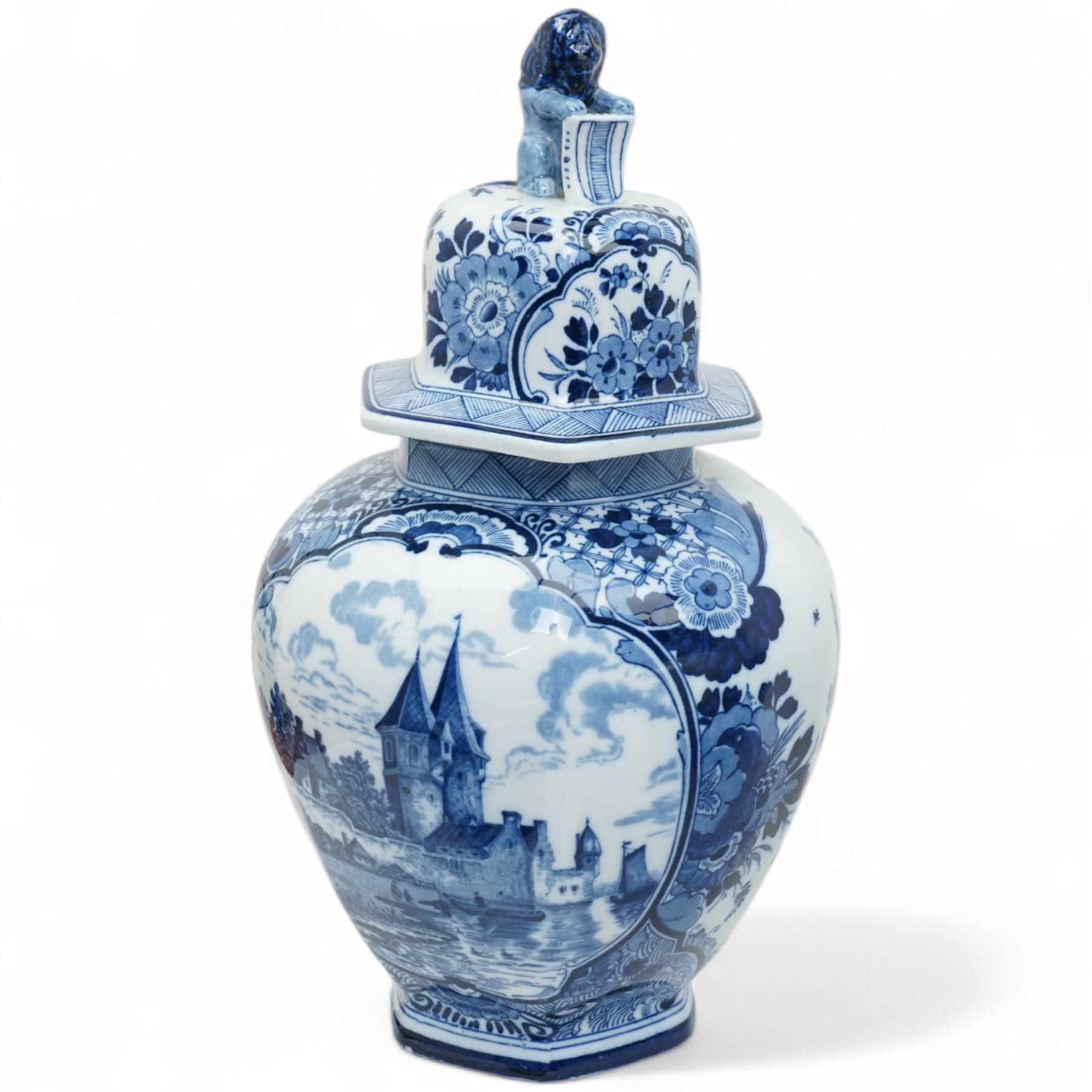 Large Spode Italian blue and white jug H23cm, 20th century Delft vase and cover decorated with landscape and floral design H38cm, Ringtons Tea Merchants blue and white tea caddy H20cm and a Ringtons jug (4)