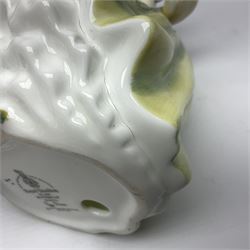 Two Royal Doulton figures, Buttercup HN2309 and Ascot HN2356, together with Capodimonte figure Hussar and His Lady 