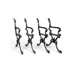 Carron Foundry - two pairs of 19th century cast iron garden bench ends, ornate detail with arms and X shaped legs,finish in black paint, the design no. 110396, first registered 13 July 1857 (see illustration), width as desired