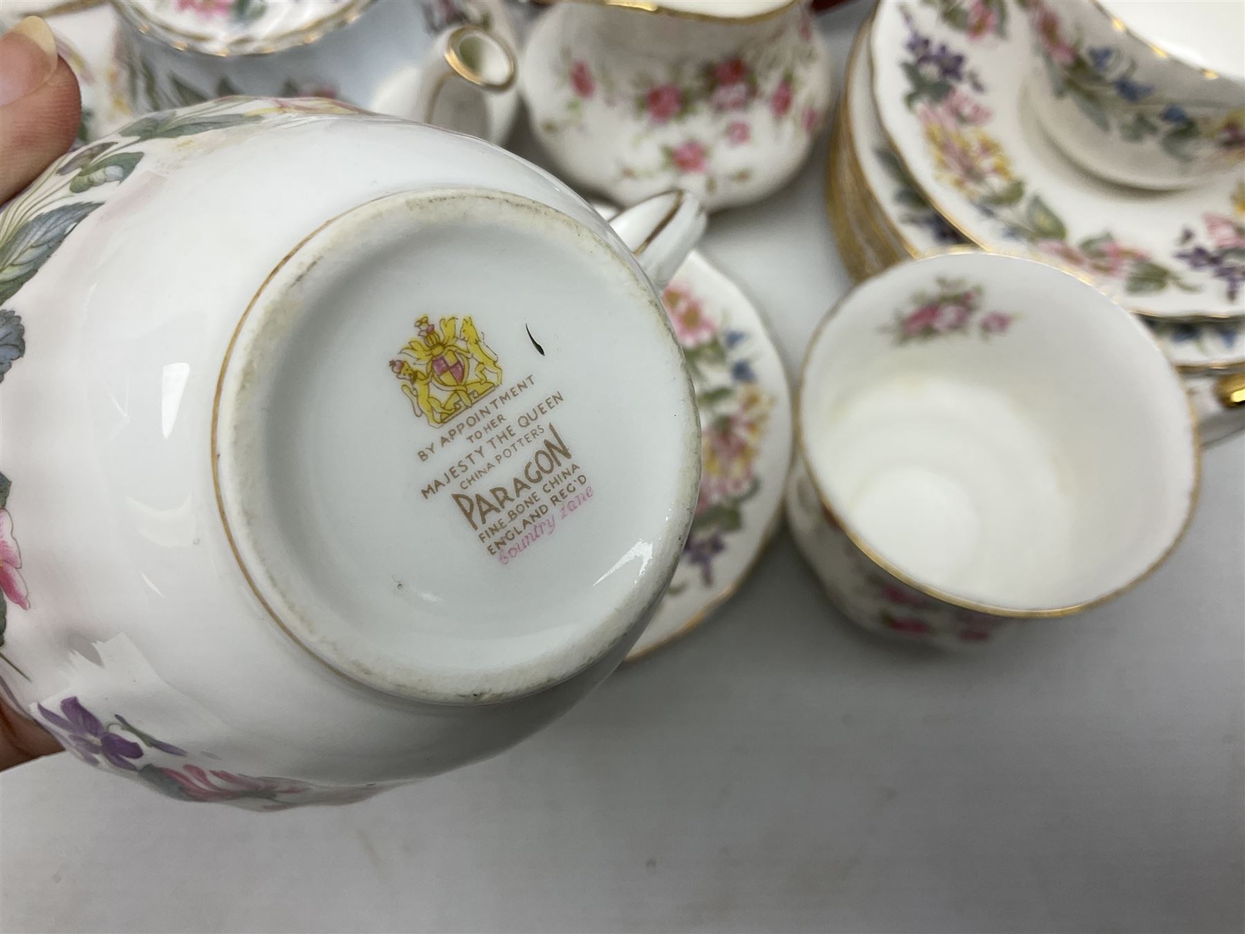 Paragon Victoriana Rose pattern tea service six and Paragon Country Lane pattern tea service for two and Vienna style plate