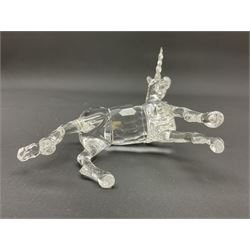 Swarovski Crystal animals, comprising white peacock, the tail with cascading blue flowers, perched eagle with yellow beak, ibex with frosted crystal horns and unicorn with frosted crystal horn, tallest H13cm