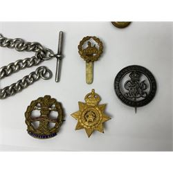 Two Services Rendered badges Nos.B23060 and B201341; two MSO BAOR (Mixed Services Organisation British Army of the Rhine) badges; small quantity of shoulder titles, lapel/sweetheart brooches, buttons and non-military related items