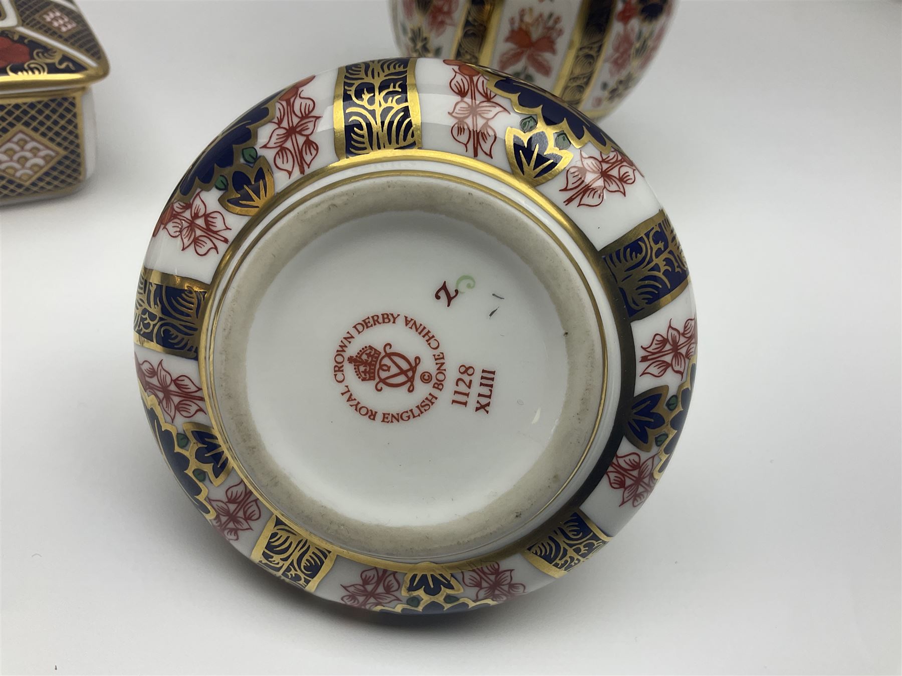 Royal Crown Derby Old Imari pattern vase, together with matching lighter and trinket box, all with printed marks beneath, vase H18cm