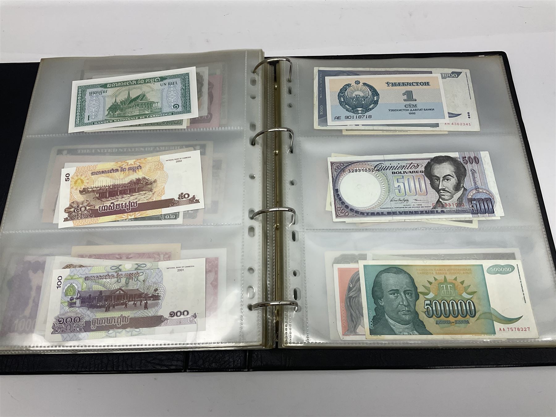 World and Great British banknotes to include Brazil, Canada, France, Germany, Ghana, Indonesia, Iraq, Hong Kong, Hungary, Japan, Vietnam, Zimbabwe, a collection of Chinese ‘Hell Money’, and quantity of ‘De La Rue Systems’ test notes, housed in ring binder and loose
