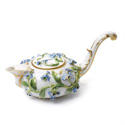 Early 19th century Meissen covered milk jug, of squat ovoid form with elongated handle, the body with encrusted forget-me-not floral decoration and leaves, with painted insects, underglaze blue crossed swords mark to base, W15cm