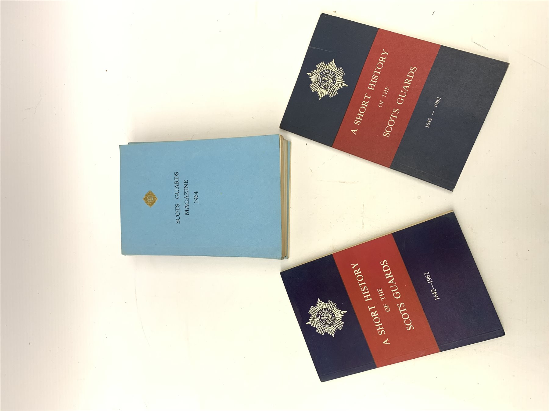 Scots Guards - ten copies of The Scots Guard Magazine, complete run 1964-73; twenty-eight copies of Scots Guards/Third Guards Club Annual Report, complete run 1947-74; A Short History of the Scots Guards. Two volumes. 1642-1962 and 1642-82; Famous Regiments - The Scots Guards; and quantity of invitations to various annual dinners, Buckingham Palace garden parties etc