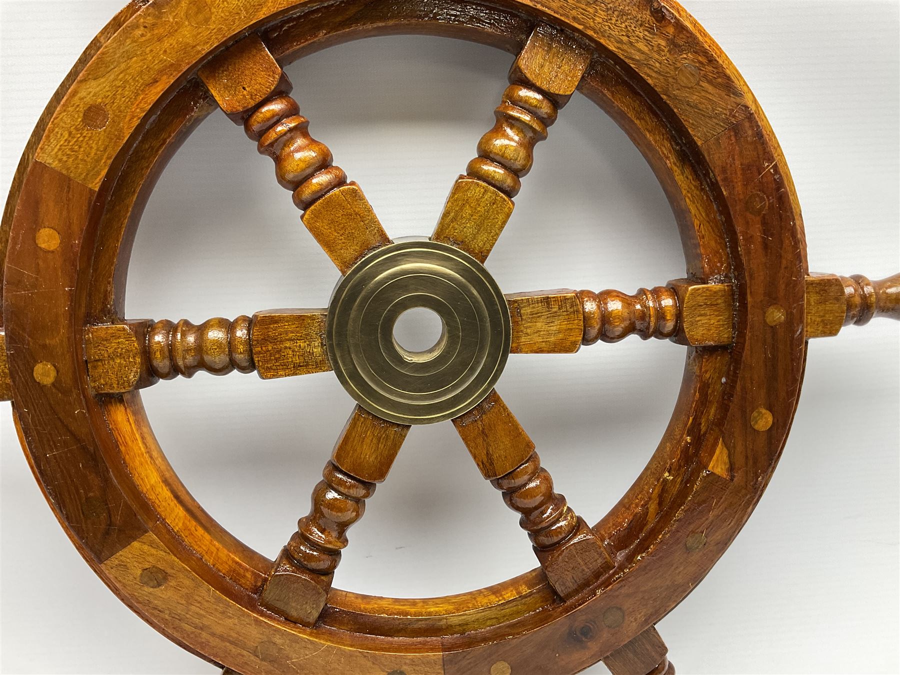 Wall hanging Spectrum quartz clock and Weathermaster barometer, together with six turned spokes ship wheel with brass central boss, D48cm