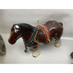Two ceramic shire horse and gypsy caravans, together with horse brasses 