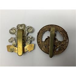 Fourteen cap badges of Irish interest including Royal Dublin Fusiliers inscribed to the slider 'From A. O'Connor 2nd Batt. Dec.2nd 1915', Connaught Rangers, South irish Horse Yeomanry, Inniskilling Fusiliers, Royal Irish Regiment etc; and seven Welsh badges including South Wales Borderers, Welsh Guards, 3rd Bn. Monmouthshire Regt. etc (21)