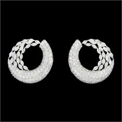 Pair of 18ct white gold marquise cut and pave set, round brilliant cut diamond crescent stud earrings, stamped, total diamond weight approx 9.30 carat
