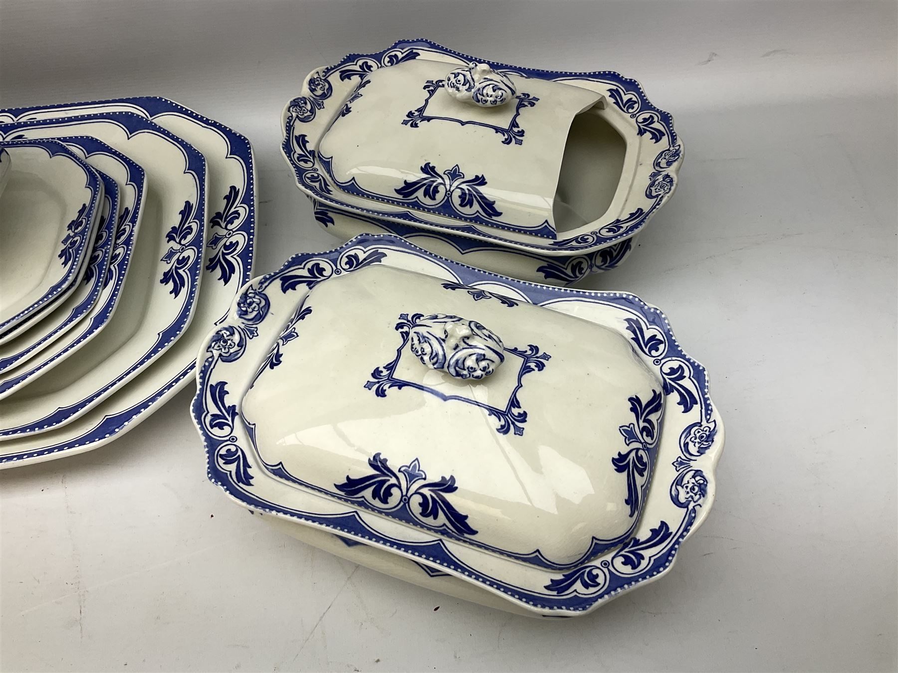 Burgess and Leigh Middleport pottery dinner wares decorated in the ‘Milford’ pattern, to include lidded tureens, graduated meat plates, dinner plates etc 