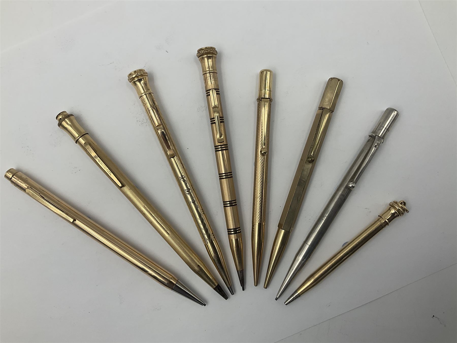 Five gold filled Wahl Eversharp propelling pencils, together with a silver propelling pencil, hallmarked London 1946, J.M.Co Johnson, Matthey & Co, and two further gold filled propelling pencils, one with box, largest L13cm (8)