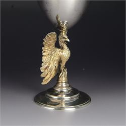 Modern limited edition silver goblet, 'made by order of the Dean and Chapter of St Paul's to commemorate the 300th anniversary of the laying of the foundation stone of the cathedral in 1675', designed by Jocelyn Burton for Aurum, the plain bowl with gilt interior, upon a parcel gilt stem in the form of a phoenix with wings outstretched,  limited edition no. 497, hallmarked Jocelyn Burton, London 1975, H16cm, boxed