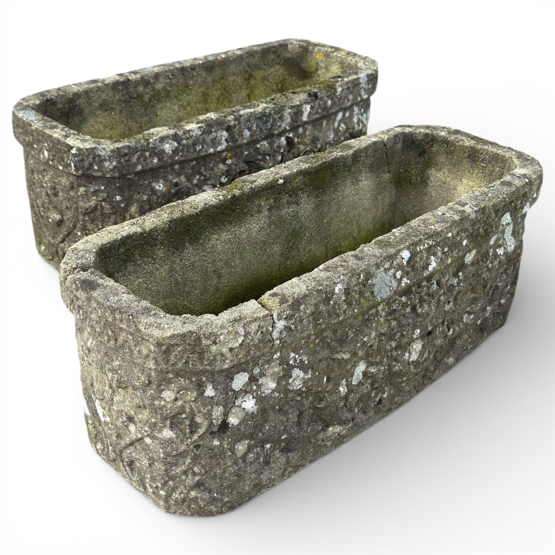 Two cast stone planters / troughs with lion emblems