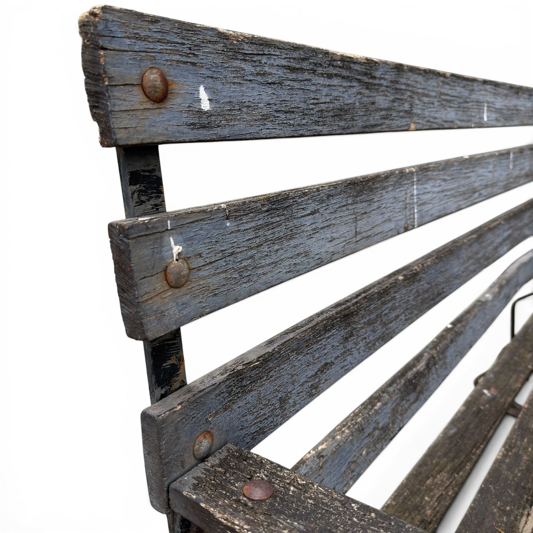 19th century wrought iron strapwork and slatted wood garden bench, the arm terminals and end supports of scrolling form