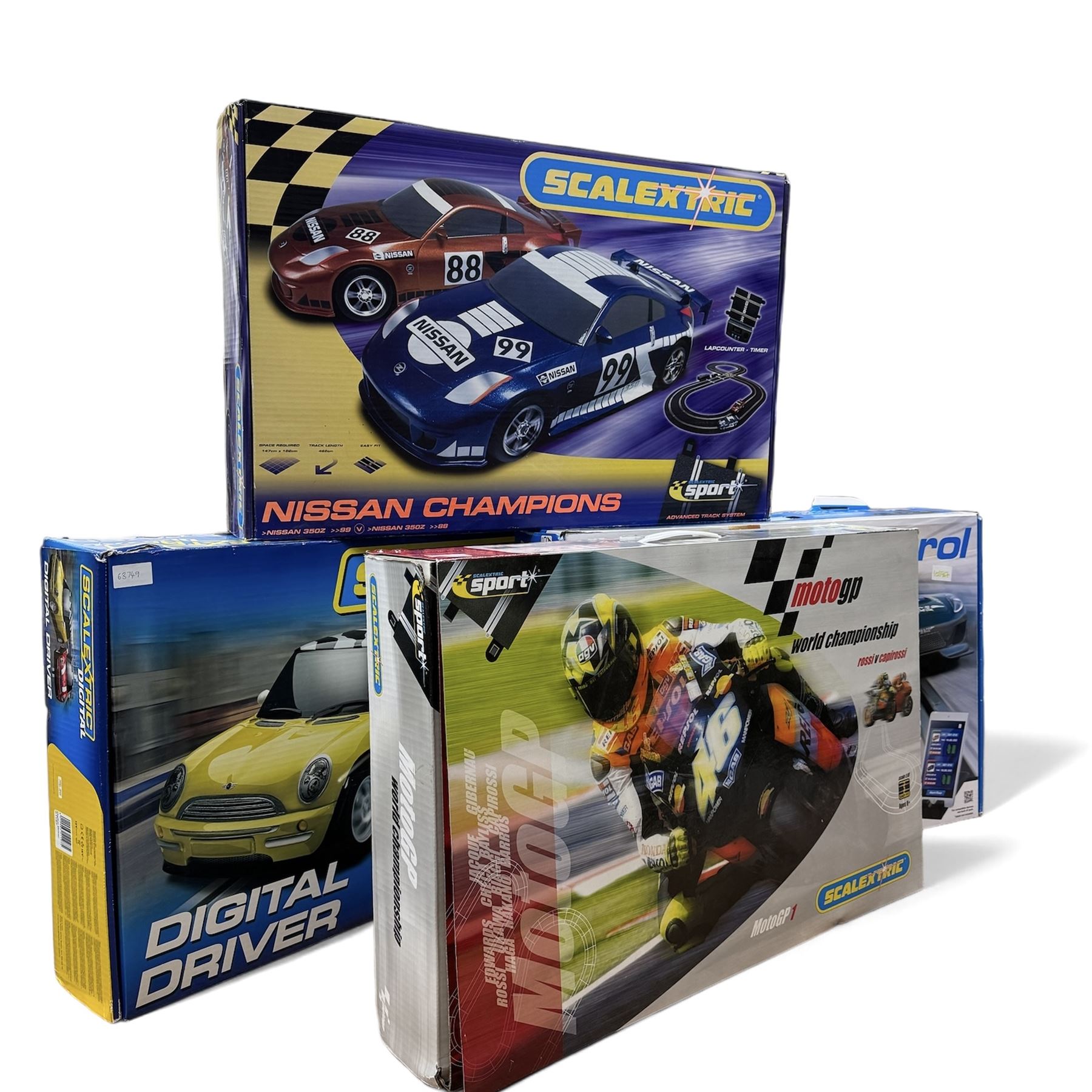 Quantity of Scalextric, including various sets; Digital Driver, Nissan Championship, Moto GP1, App Race control set and a collection of track and other accessories as per list