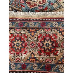 Persian Ardabil rug, the field with multiple geometric panels decorated with floral and stylised motifs, repeating guarded border