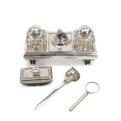 Silver plated desk stand, with three hinged compartments, two with recesses for glass inkw...