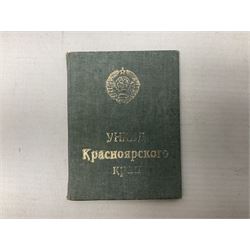 WW2 Soviet KGB officer I.D. book containing photograph, seal stamps and signatures. Roughly translates as 'USSR Peoples Commissariat for Internal Affairs Krasnoyarsk Region Directorate Senior Lieutenant 1st Class Deputy Head of Communications Nikolay Storozhuk c1943