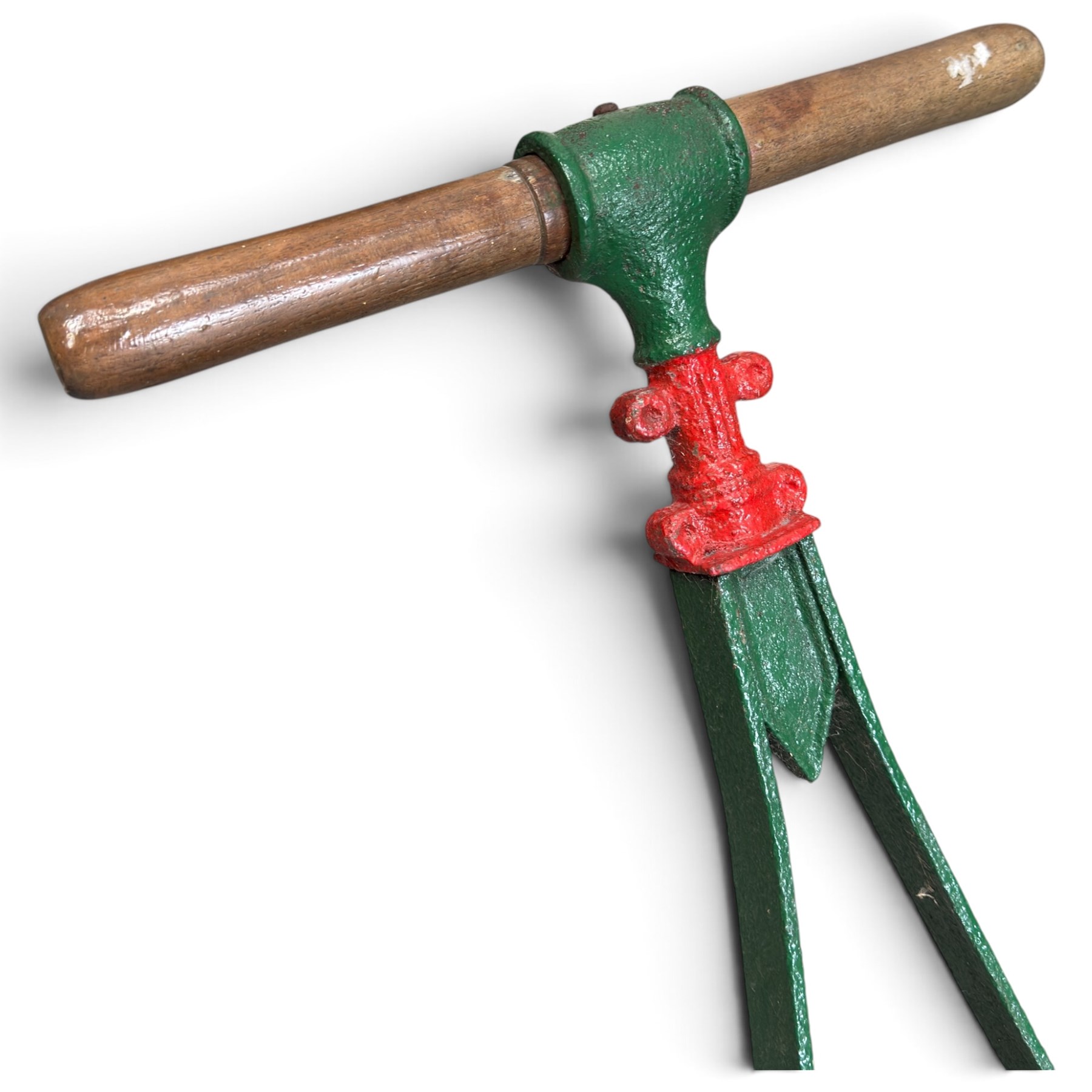 Woollons & Harwood Ltd., York - Edwardian green and red-painted cast iron garden roller, handle and stem over circular rampant Lion plaque stamped with maker