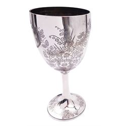 Victorian silver goblet, the bowl chased with flowers and foliage, upon a tapering stem and spreading circular foot with conforming decoration, hallmarked Thomas White, London 1887, H21.5cm, approximate weight 8.30 ozt (258.2 grams)