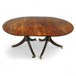 Late 19th-century twin pedestal dining table with two leaves, oval top with reeded edge, s...