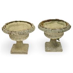 Pair of 20th-century Victorian design cast stone garden urns (2)