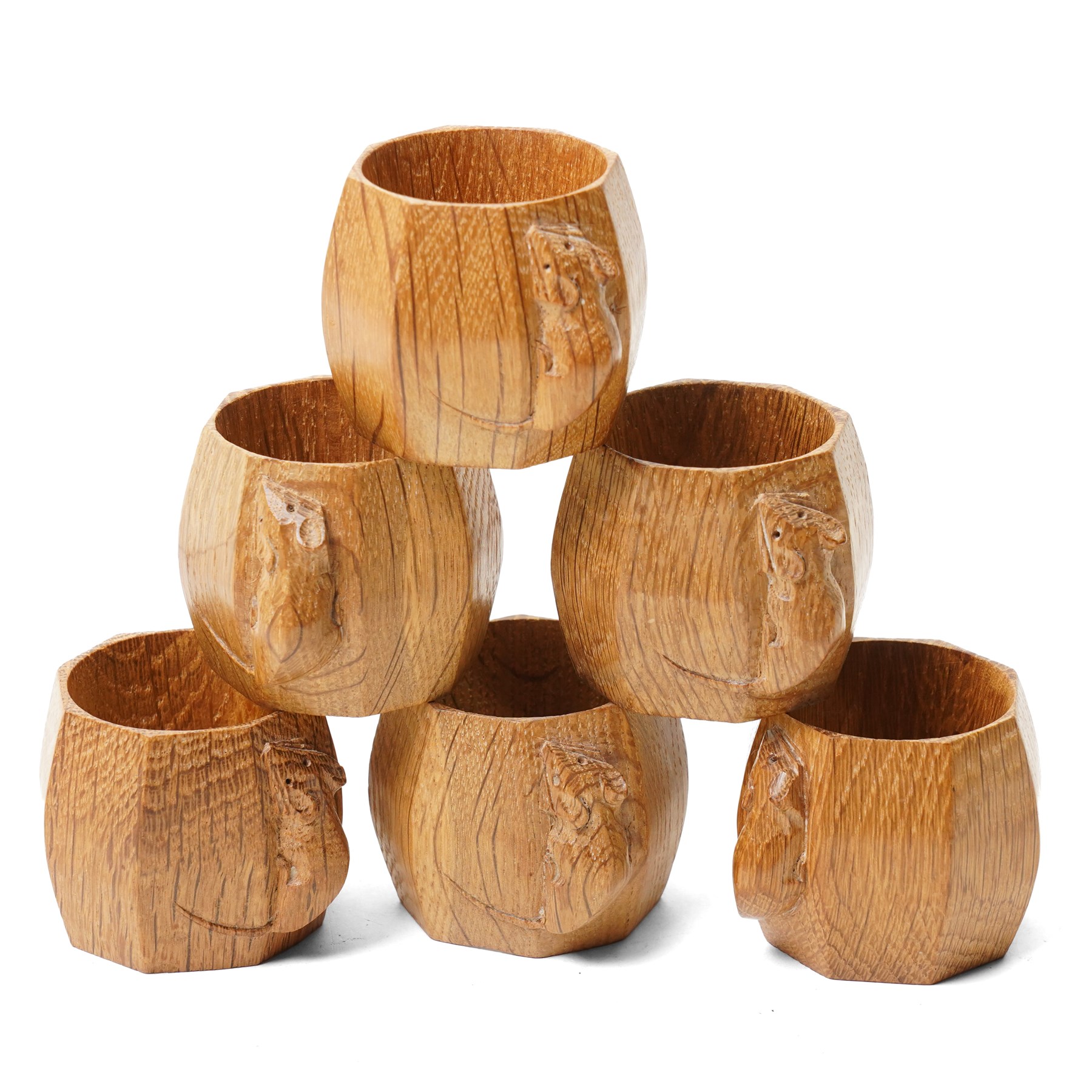 Mouseman - set of six oak napkin rings, with carved mouse signature, by the workshop of Robert Thompson of Kilburn