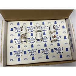 Quantity of thimbles to include twelve Irish Dresden lace examples, Royal Crown Derby, Spode, Portmeirion, Wedgwood, Royal Grafton etc, together with three display cases, many with certificates