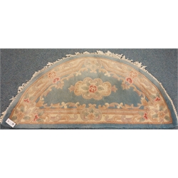  Pink ground Chinese rug, central medallion depicting two birds, repeating border (184cm x 128cm), two other similar rug (275cm x 185cm max) and a semi circle rug (4)  