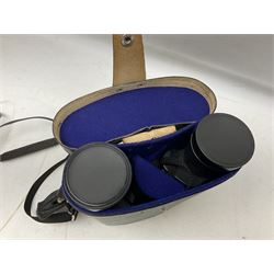 Olympus OM10 35mm camera, cased; pair of USSR 7 x 50 binoculars; cased; and pair of Le Jockey Club Paris binoculars