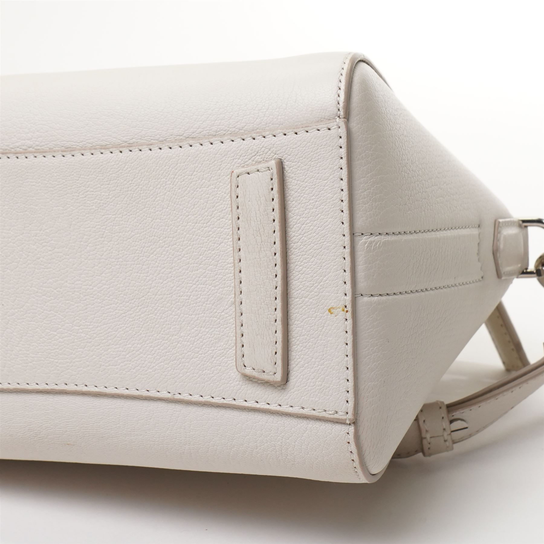 Givenchy - ‘Antigona’ Mini Bag, introduced circa 2011 under Riccardo Tisci, in structured white grained goat leather, with twin top carrying handles and detachable wide adjustable crossbody strap, with silver tone hardware, with original dust bag