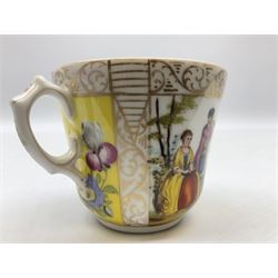 Dresden teacup and saucer, decorated with alternating panels of courting figures, and floral sprays against a yellow ground, with mark beneath, teacup H6.5cm
