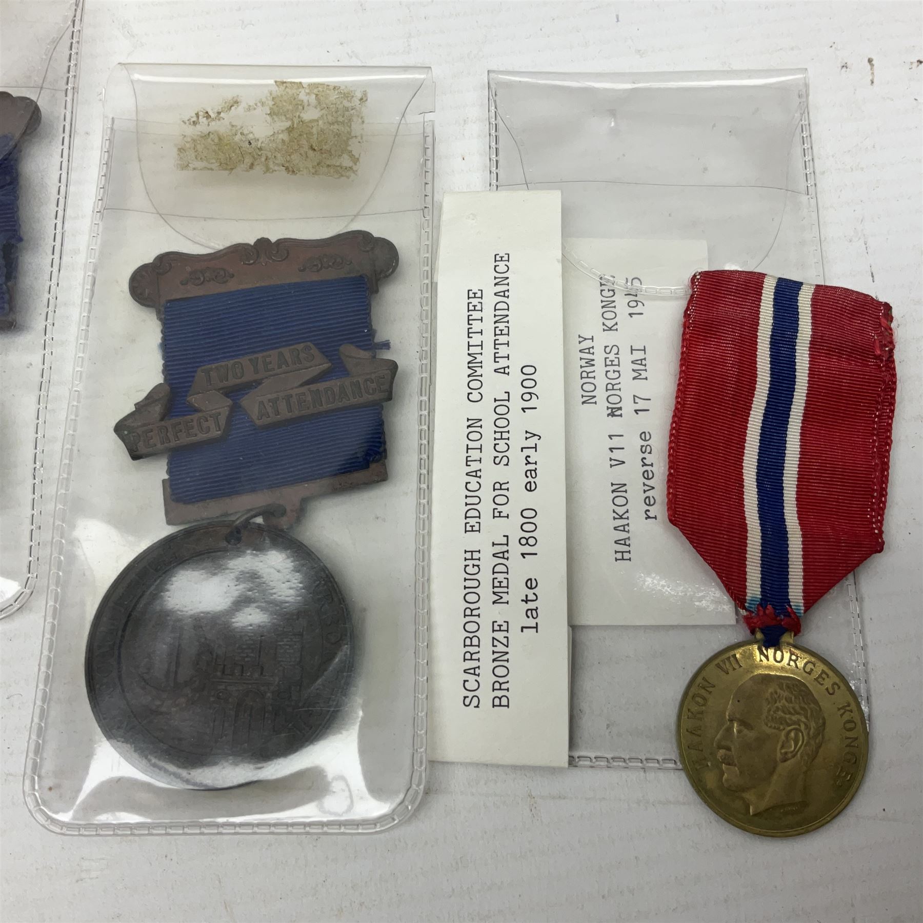 Japanese Order of the Sacred Treasure Medal (Zaihosho) in lacquered box; Norwegian Grunnlovsdag 1945 Medal with National Flag ribbon; three school attendance medals; four Royalty commemorative medals including both Victoria jubilees; quantity of medal ribbons and medal bars; medal issue boxes; badges; booklets etc