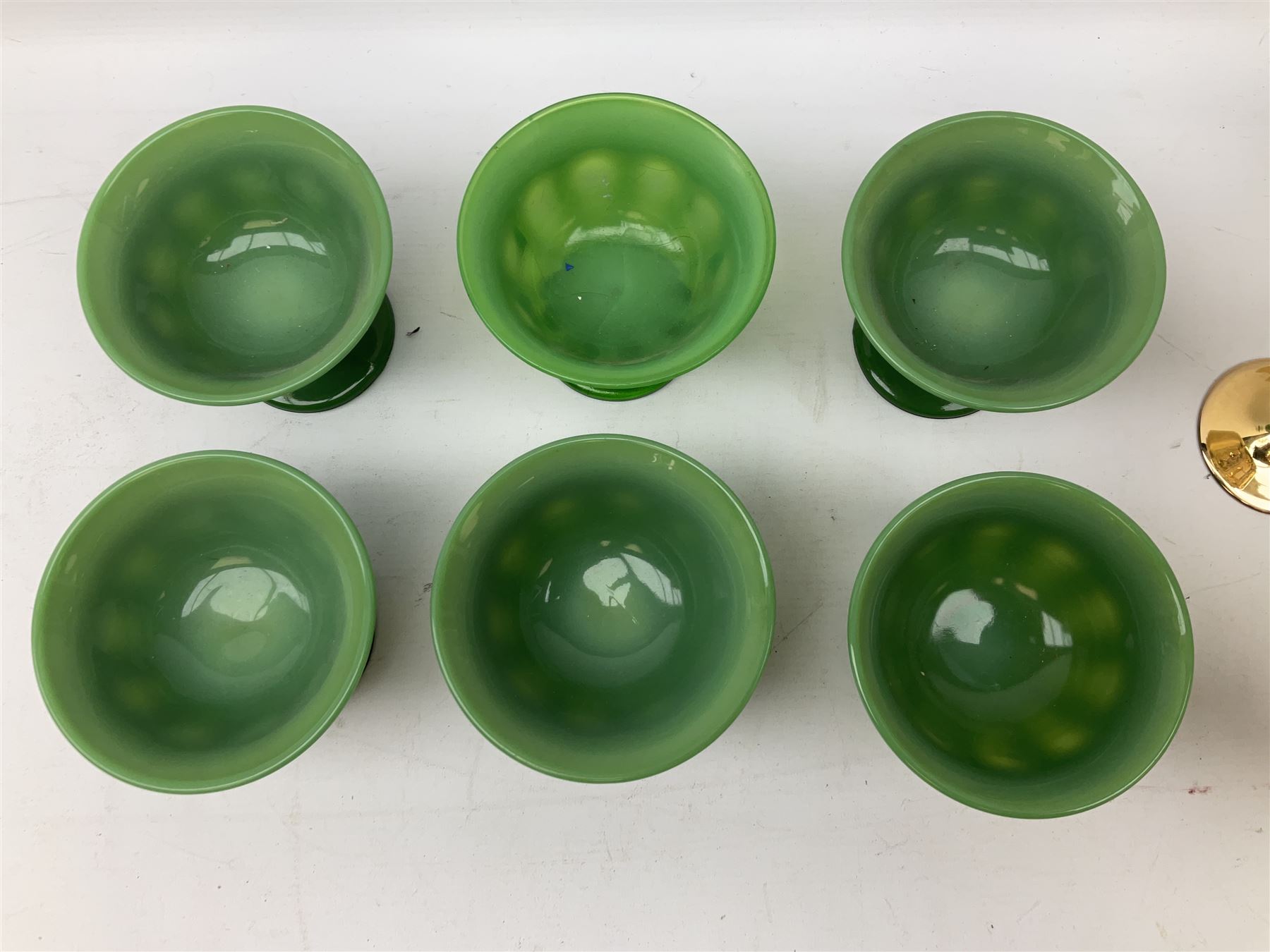 Set of six Art Deco style green glass sundae dishes, H9cm along with set of six Bohemian style glasses with twisted gilt stems
