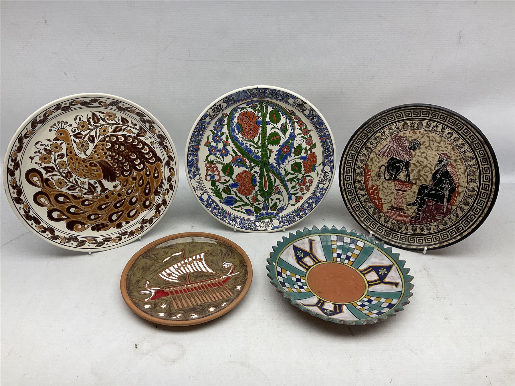 Two Greek Kerameikos plates together with a Kepamik plate and other Grecian style ceramics, carved African figures and treen, boxes etc 