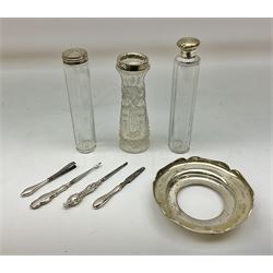 1920's silver stand, hallmarked Birmingham 1922, together with two tall faceted clear glass dressing table jars with hallmarked silver covers, and cut glass vase with hallmarked silver mounted collar, and small group of silver handled accessories, including files, picks, etc., approximate total silver weight 58.8 grams