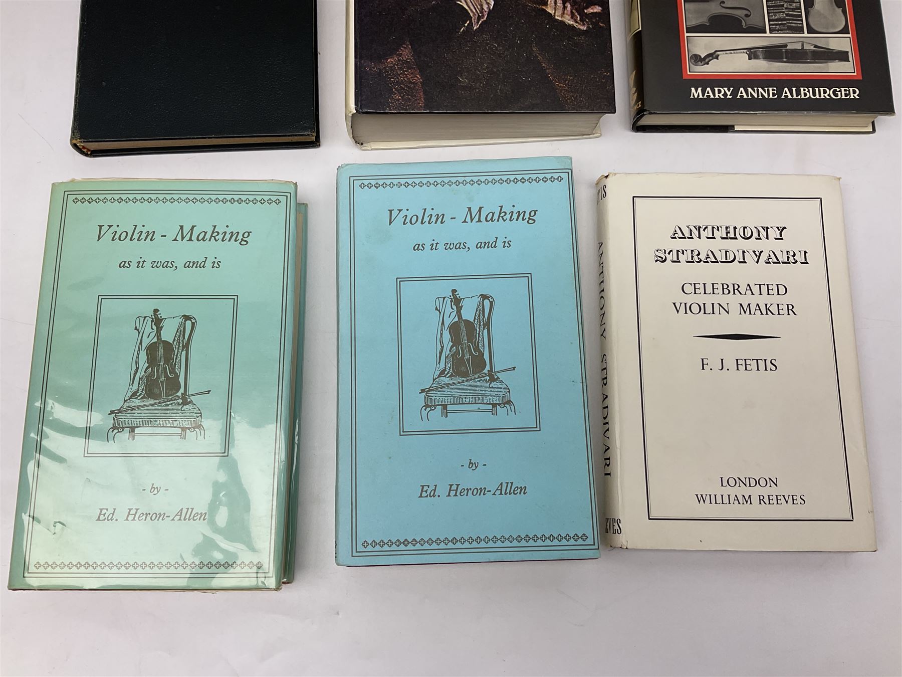 Fourteen books on violins and violin makers including Henley William: Universal Dictionary of Violin and Bow Makers. Five volumes. 1959/60. All first editions with dustjackets; Jalovec Karel: Encyclopaedia of Violin Makers. Two volumes. 1968. Vol.1 with d/j; Heron-Allen Ed.: Violin making As It Was, And Is. Two copies 1984 & 1991. Both with d/j; Henley W.: Antonio Stradivari. 1961; Fetis F.J.: Anthony Stradivari Celebrated Violin Maker. 1964 facsimile edition; Boyden David D.: catalogue of the Hill Collection of Musical Instruments in the Ashmolean Museum. 1979; and two others (14)