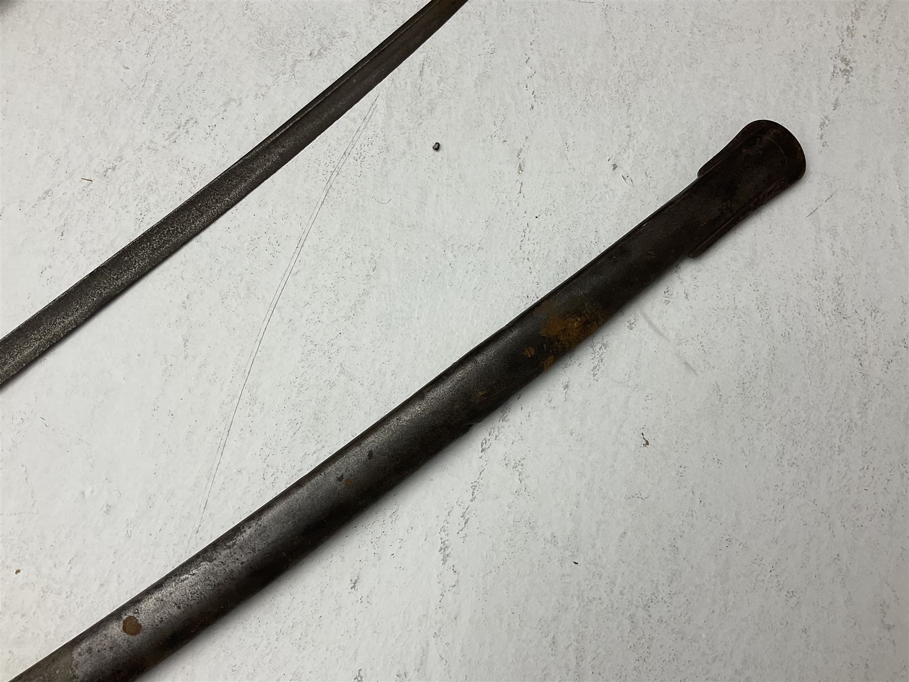 19th century Imperial German army heavy cavalry officers sword by Schnitzler and Kirschbaum, with 89cm single fullered steel blade and sheet steel basket hilt with teardrop cut-out and wire-bound leather grip L107.5cm overall; in steel scabbard with two suspension rings; and British Army 1822 Pattern Infantry Officer's sword in associated scabbard (2)
