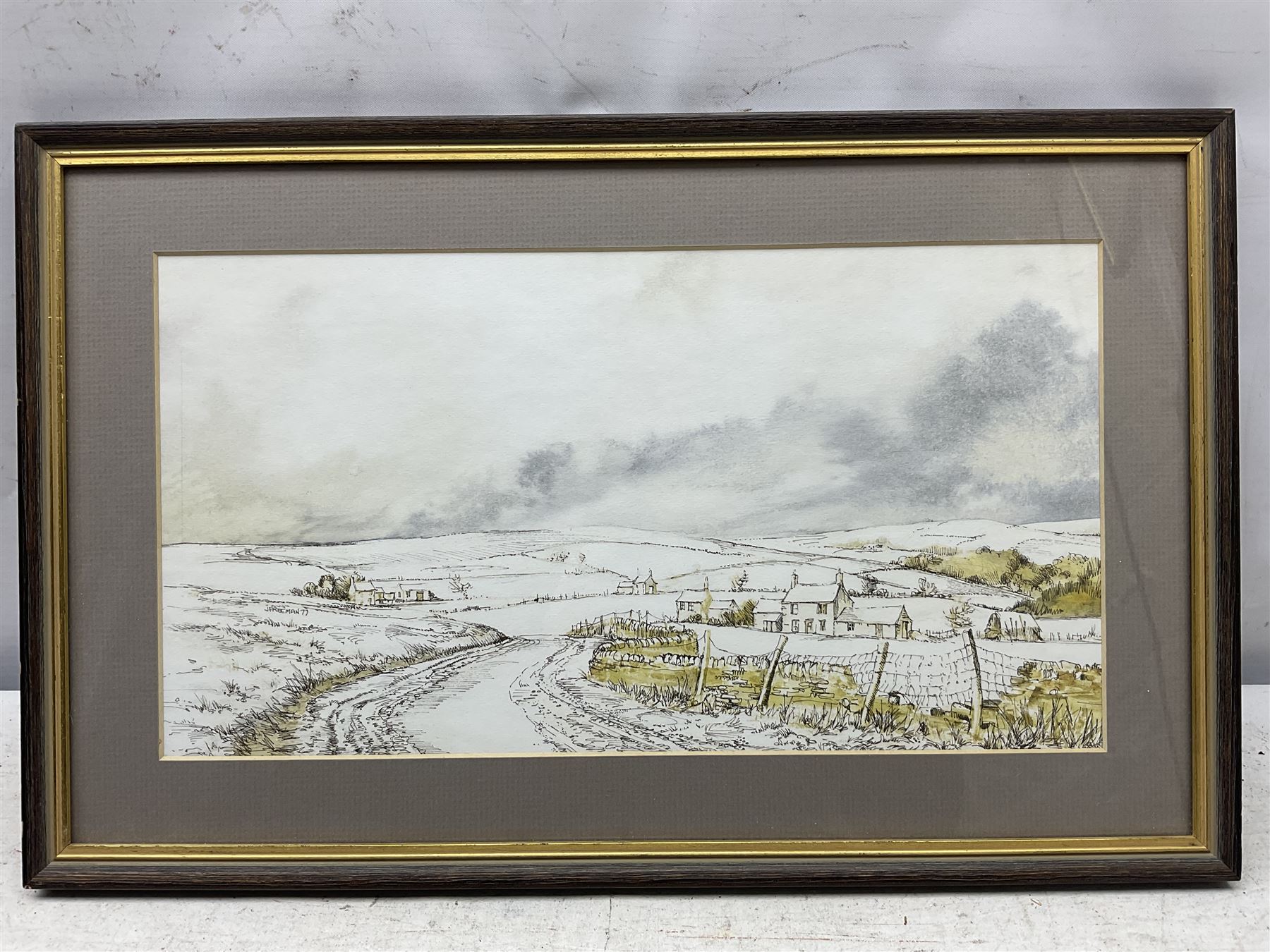 John Freeman (British 1942-): Snowy Landscapes, pair watercolours signed and dated ‘77, 17cm x 34cm (2)