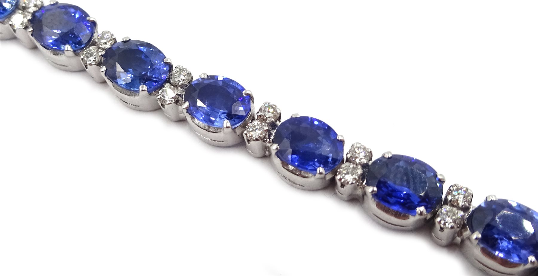 18ct white gold oval sapphire and diamond bracelet, stamped 750, total sapphire weight approx 12.00 carat