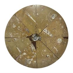 Circular limestone table top, with orthoceras and goniatite inclusions; age: Upper Devonian, location: Morocco, D45cm