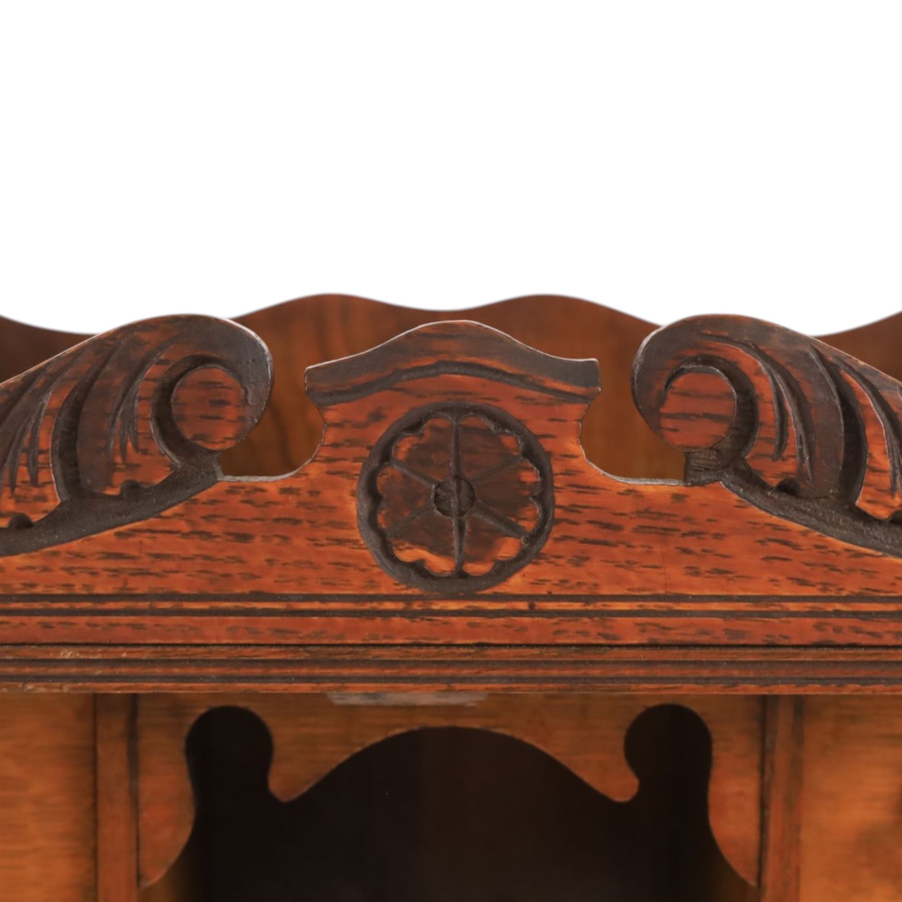 19th century oak table top smokers cabinet, with carved foliate pediment, the two beveled edge glass doors opening to reveal a fitted interior, with four drawers and fitted brass of pipe holders to each door, H46cm